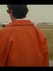 Movie Race for Glory 2024 Cesare Fiorio Orange Jacket